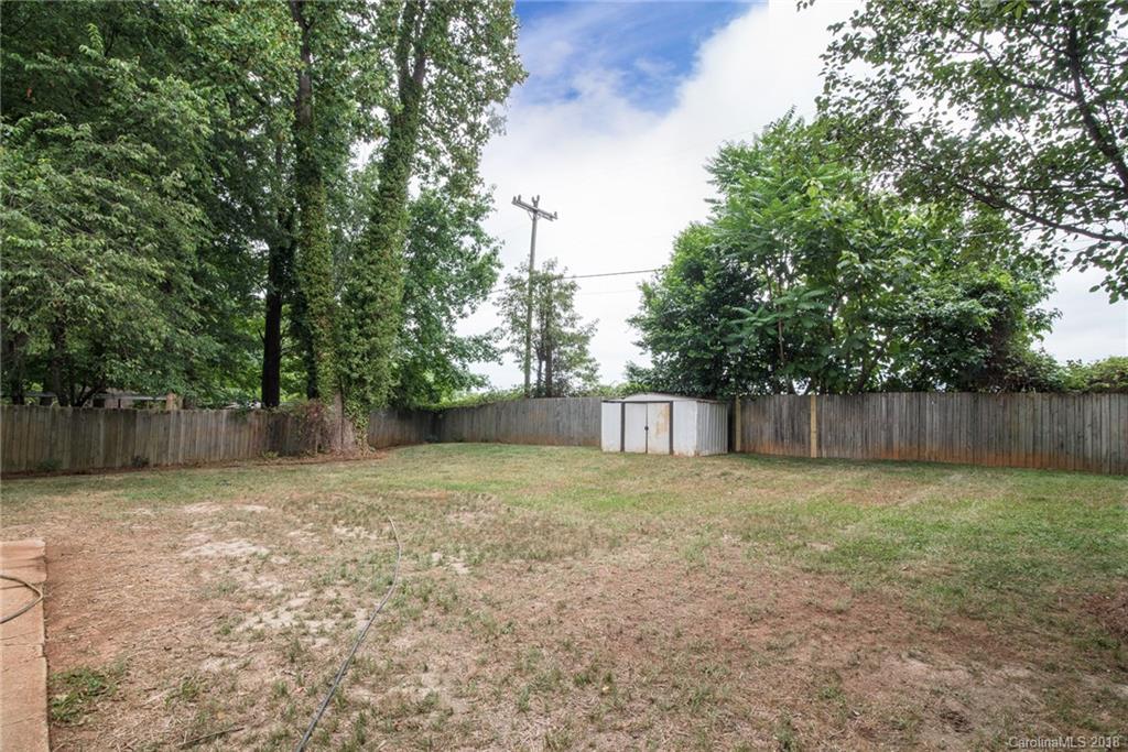 2431 Eaton Road Charlotte, NC 28205 - Photo 19 of 19 a view of backyard with tree