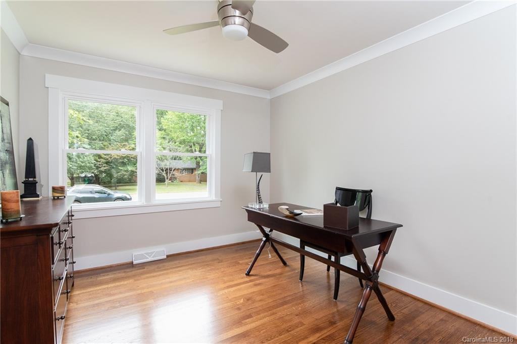 2431 Eaton Road Charlotte, NC 28205 - Photo 9 of 19 a workspace with furniture and a window