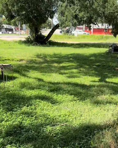 a view of a golf course with a lake