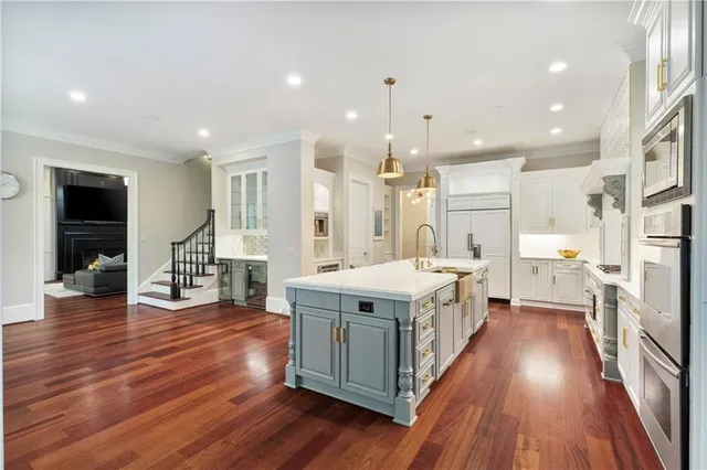 a living room with furniture fireplace and flat screen tv