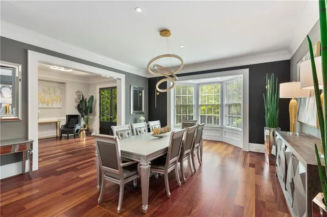 a bathroom with a toilet and a mirror