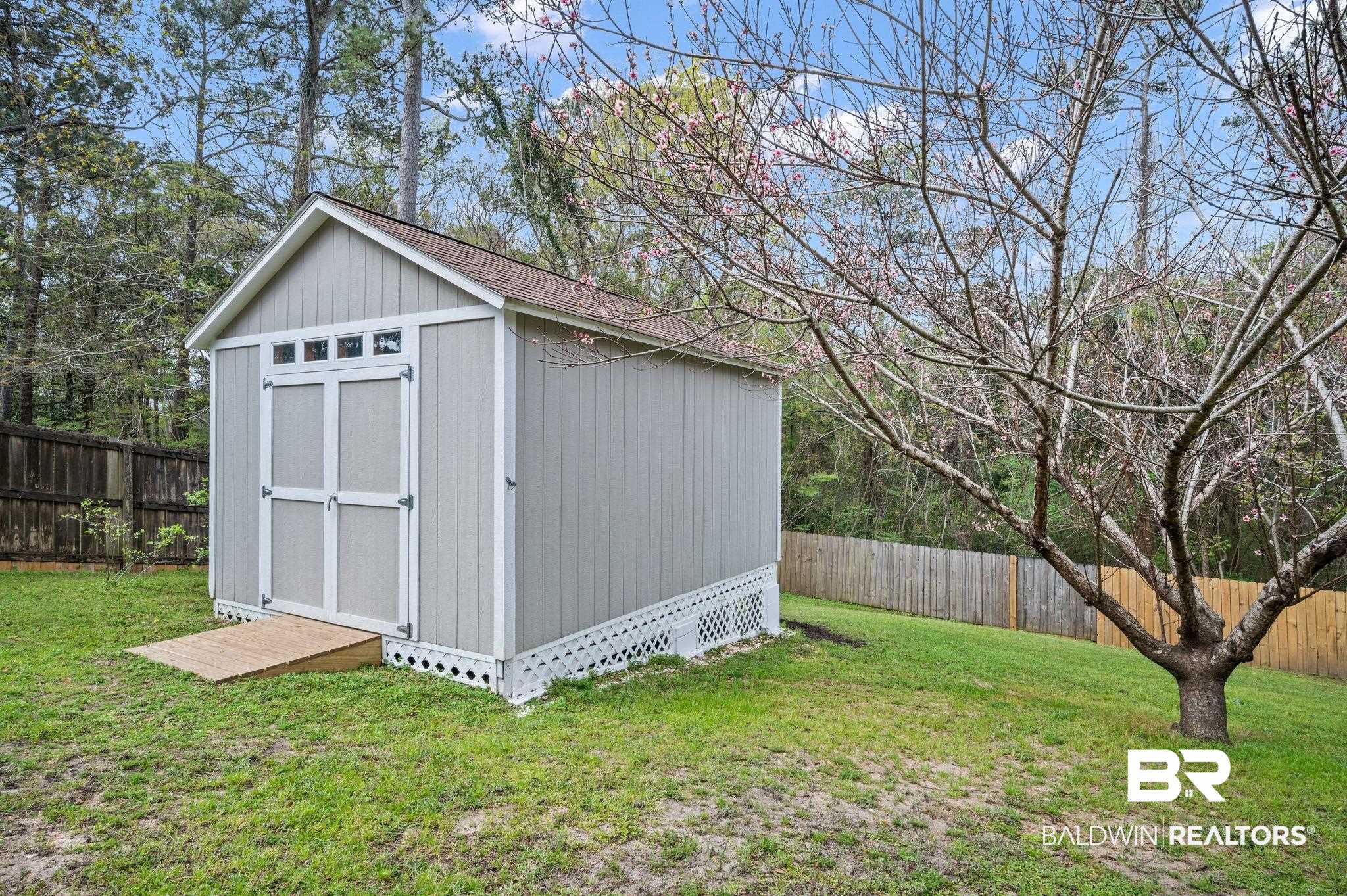 18 Lee Circle Spanish Fort, AL 36527 - Photo 29 of 50 Hurricane strapped and solar powered!