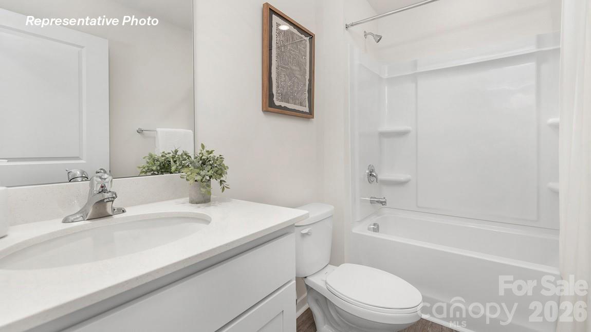 435 Frozen Dream Road Salisbury, NC 28147 - Photo 14 of 20 a bathroom with a sink a toilet and shower