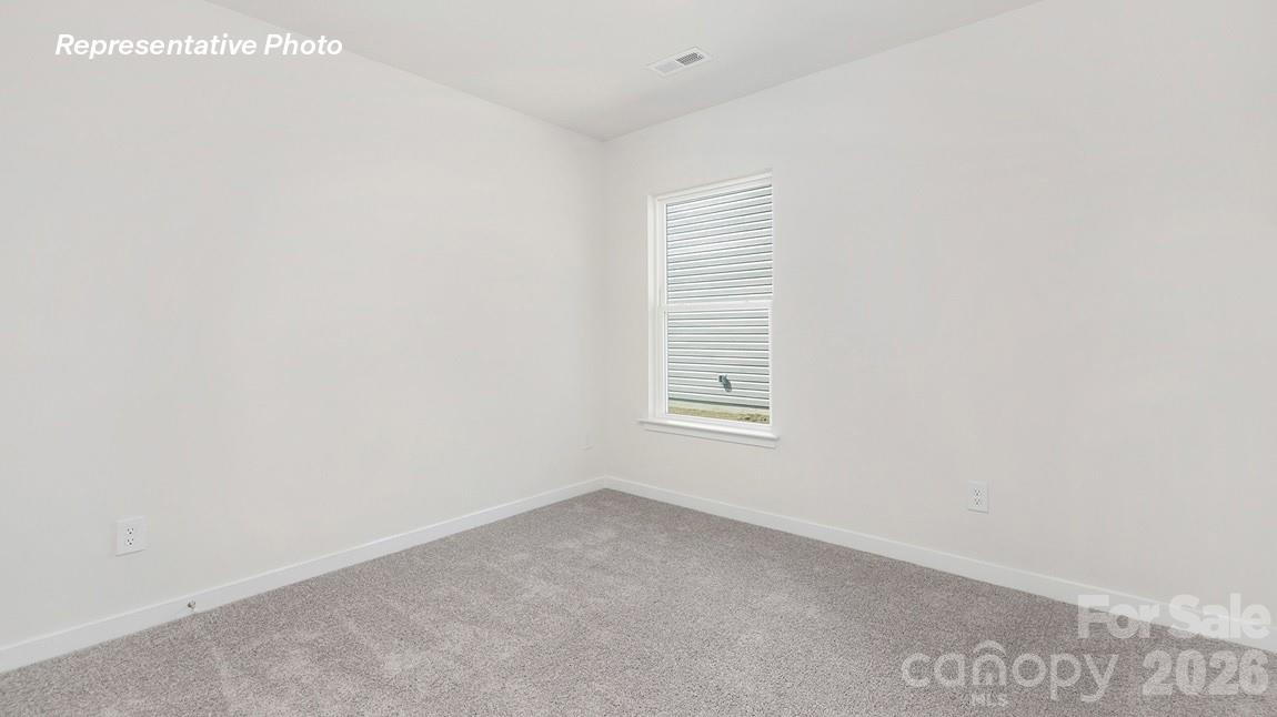 435 Frozen Dream Road Salisbury, NC 28147 - Photo 15 of 20 a view of an empty room with a window