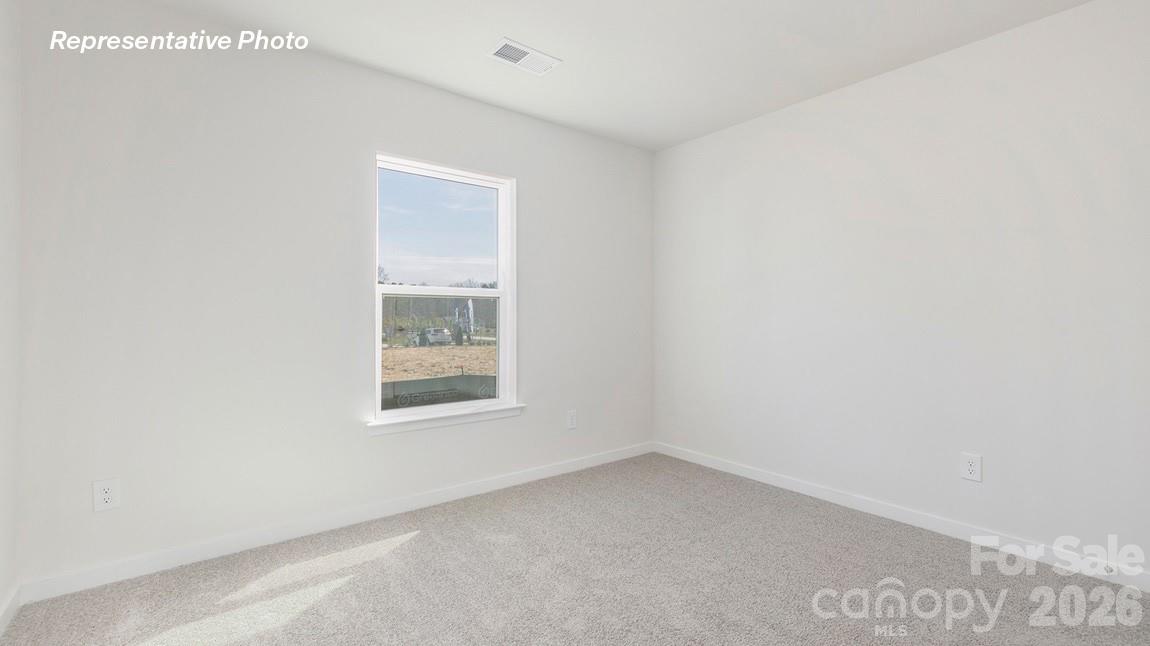 435 Frozen Dream Road Salisbury, NC 28147 - Photo 17 of 20 a view of an empty room with a window