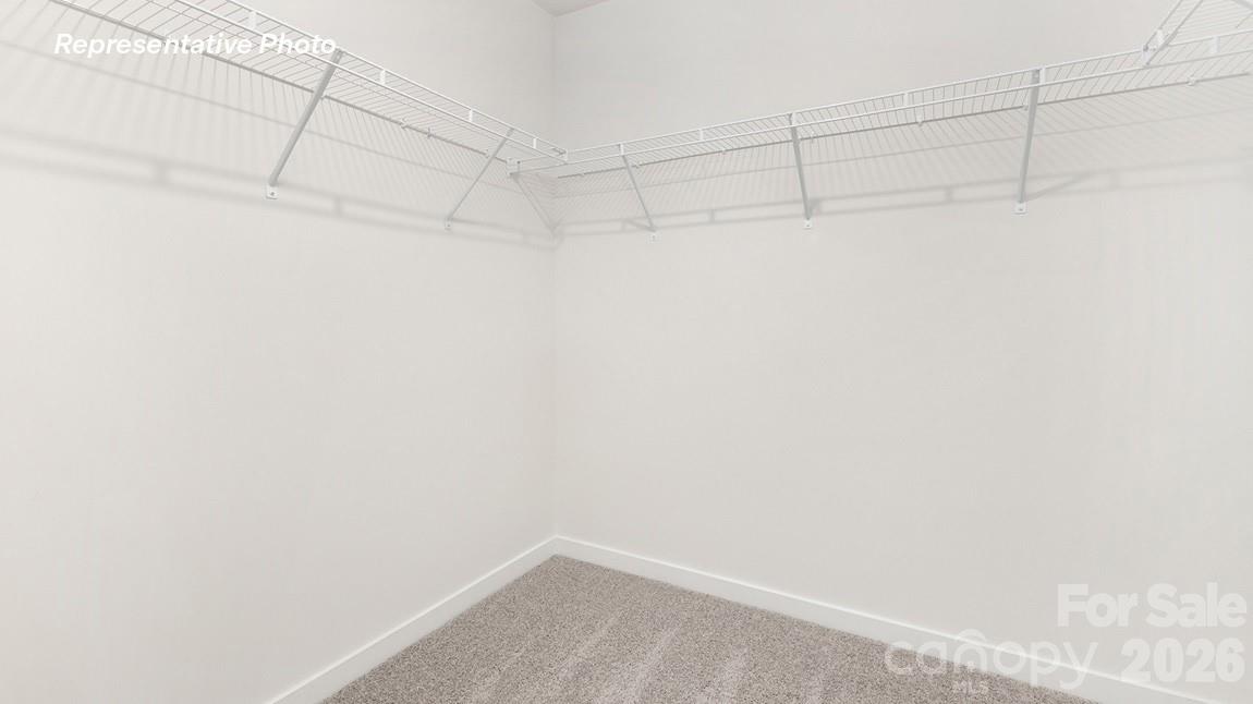 435 Frozen Dream Road Salisbury, NC 28147 - Photo 10 of 20 a view of a room with racks on the wall
