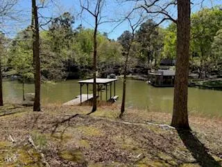 a view of a lake with a house