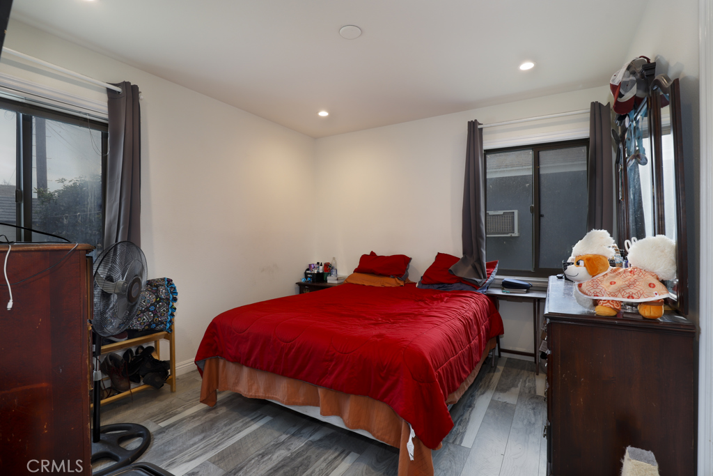 15040 Root Street Baldwin Park, CA 91706 - Photo 5 of 23 a bedroom with bed and window