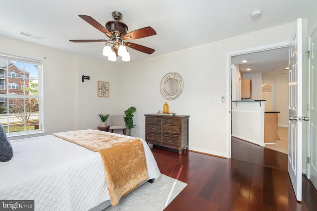 a bed room with a bed and a window