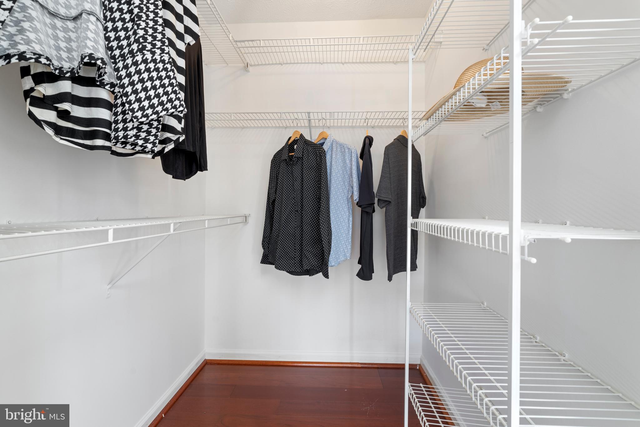9602 Haven Farm Road, Unit 9602B Perry Hall, MD 21128 - Photo 28 of 37 a view of walk in closet with clothes