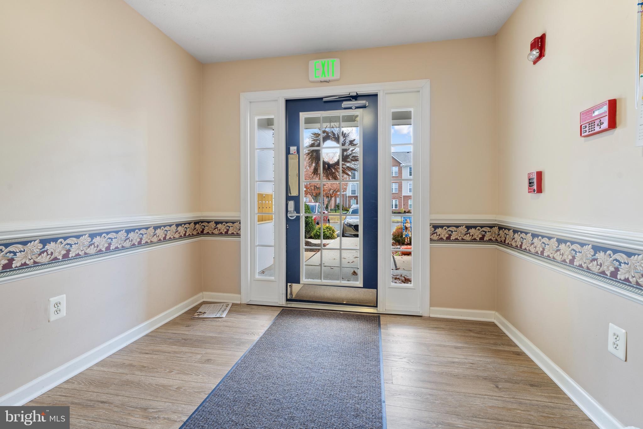 9602 Haven Farm Road, Unit 9602B Perry Hall, MD 21128 - Photo 3 of 37 a view of a hallway with wooden floor and entryway