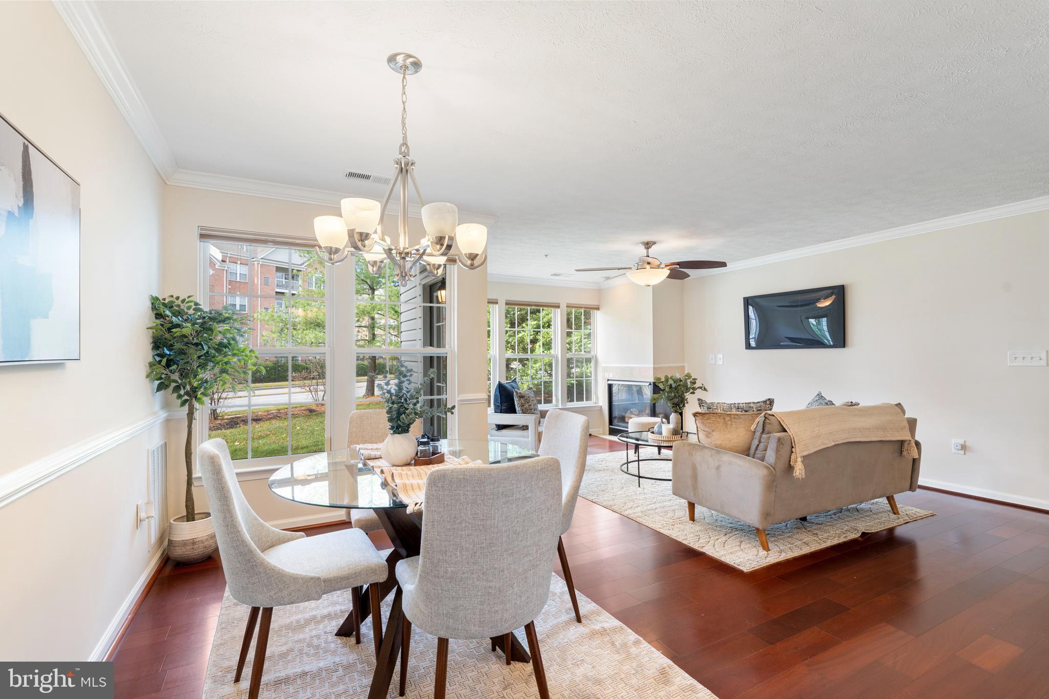 9602 Haven Farm Road, Unit 9602B Perry Hall, MD 21128 - Photo 6 of 37 a living room with furniture a chandelier and a table