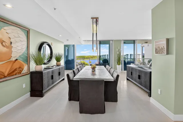 a kitchen with stainless steel appliances granite countertop a sink and a stove