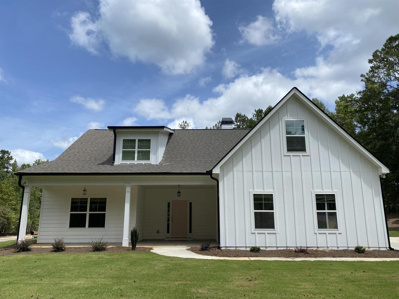 251 Walt Carmichael Road, Unit 7 Newnan, GA 30263 - Photo 1 of 1 a view of a back yard of the house