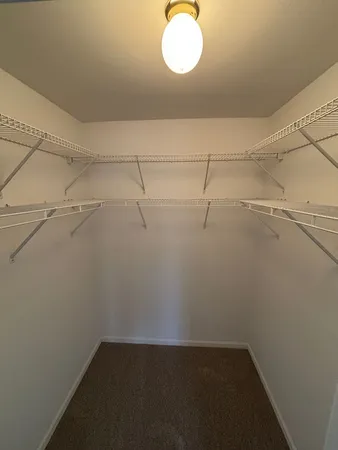 a view of a room with racks on the wall