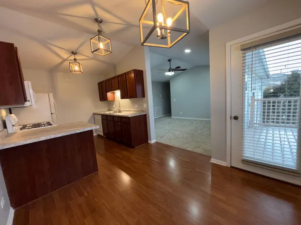 a spacious bathroom with a sink and a mirror