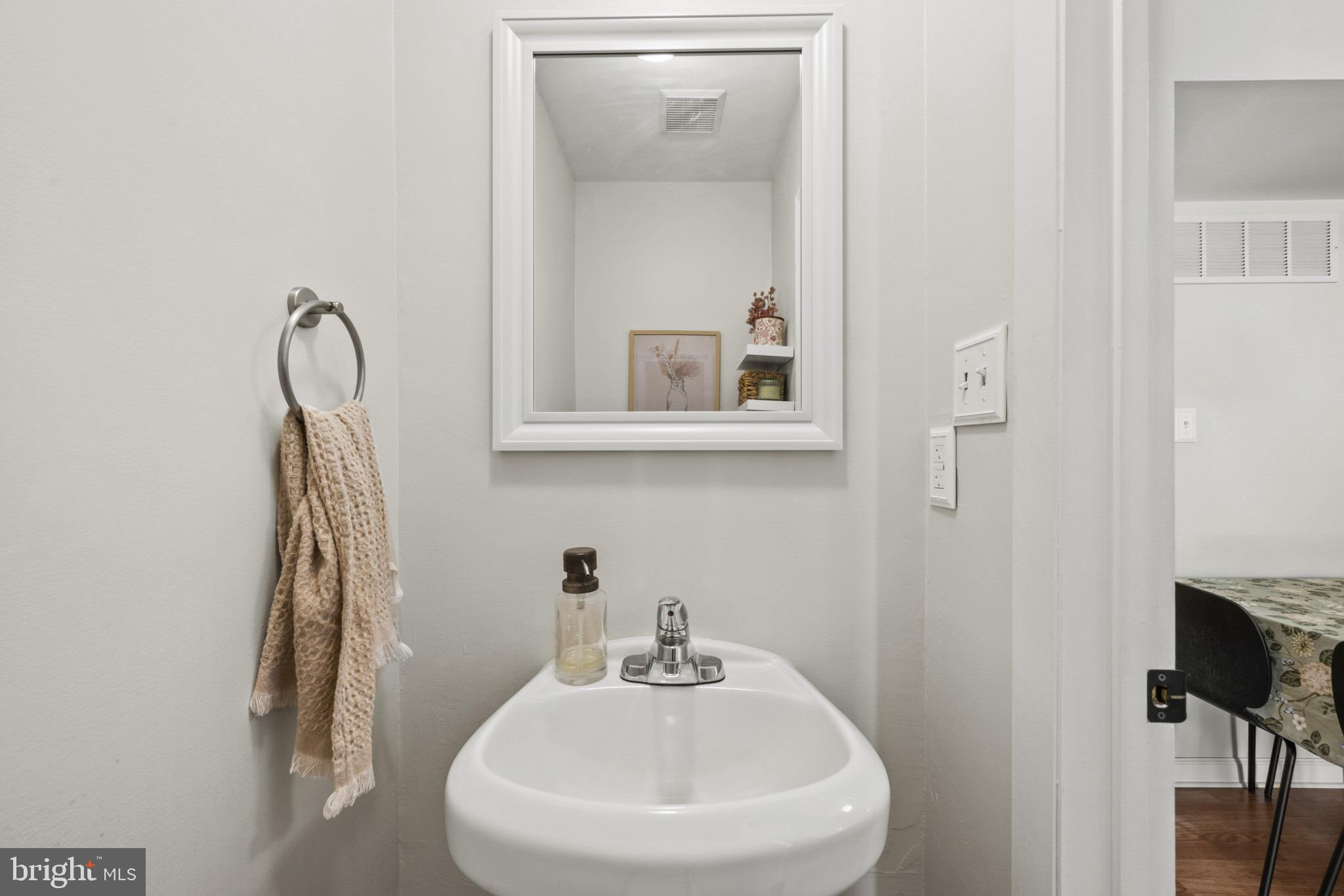 38 Ritters Ridge Court, Unit 38 Owings Mills, MD 21117 - Photo 13 of 36 Half bathroom on main level
