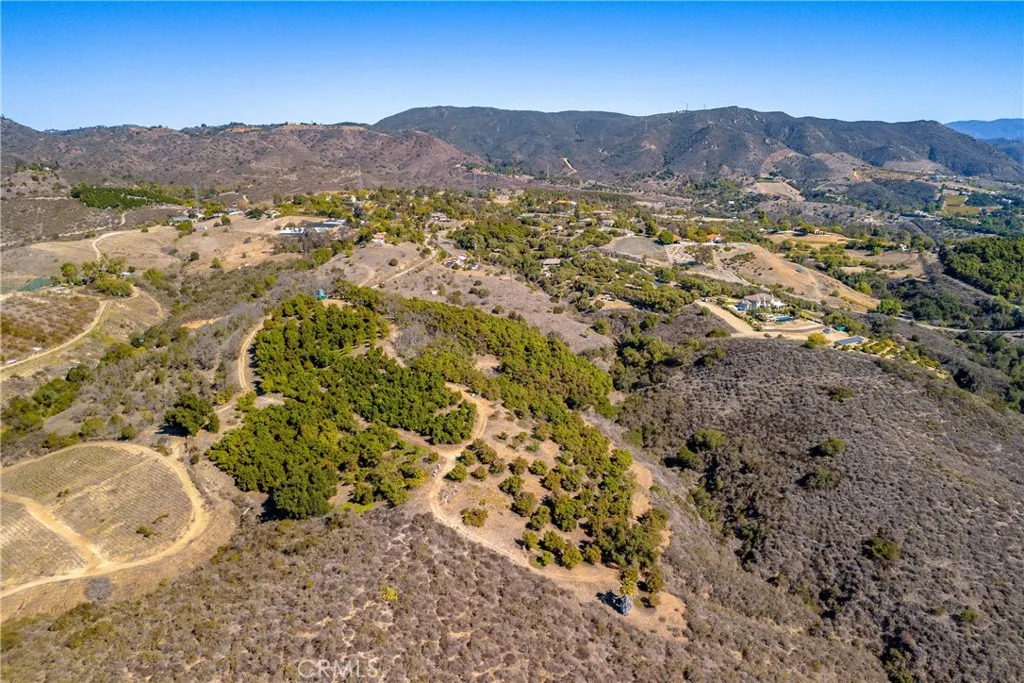 0 Mira Monte Road Fallbrook, CA 92028 - Photo 4 of 23 a view of a lush green hillside and houses