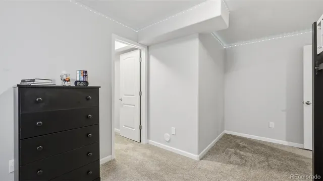 a view of a livingroom with a dresser