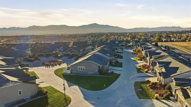 an aerial view of a house with a outdoor space