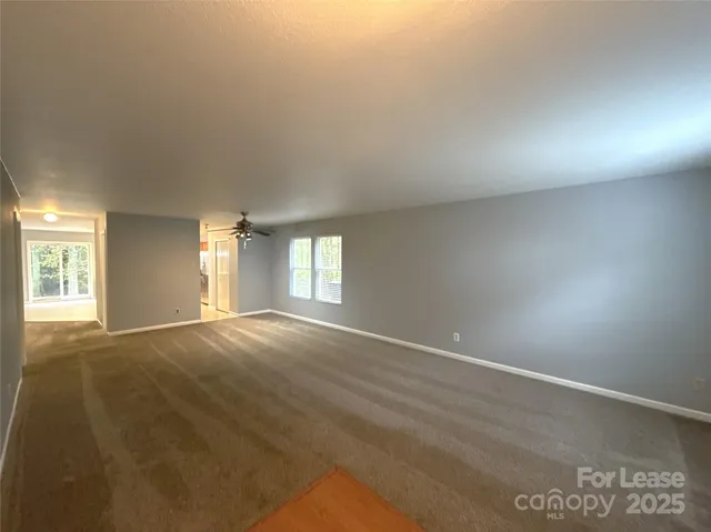 a view of an empty room with window