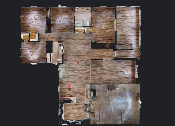 a brick house with trees in front of it