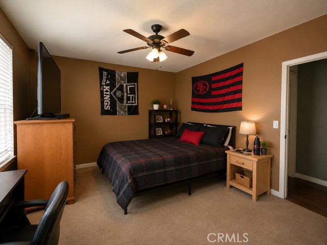 28820 Memory Winchester, CA 92596 - Photo 8 of 18 a bedroom with a bed and dresser