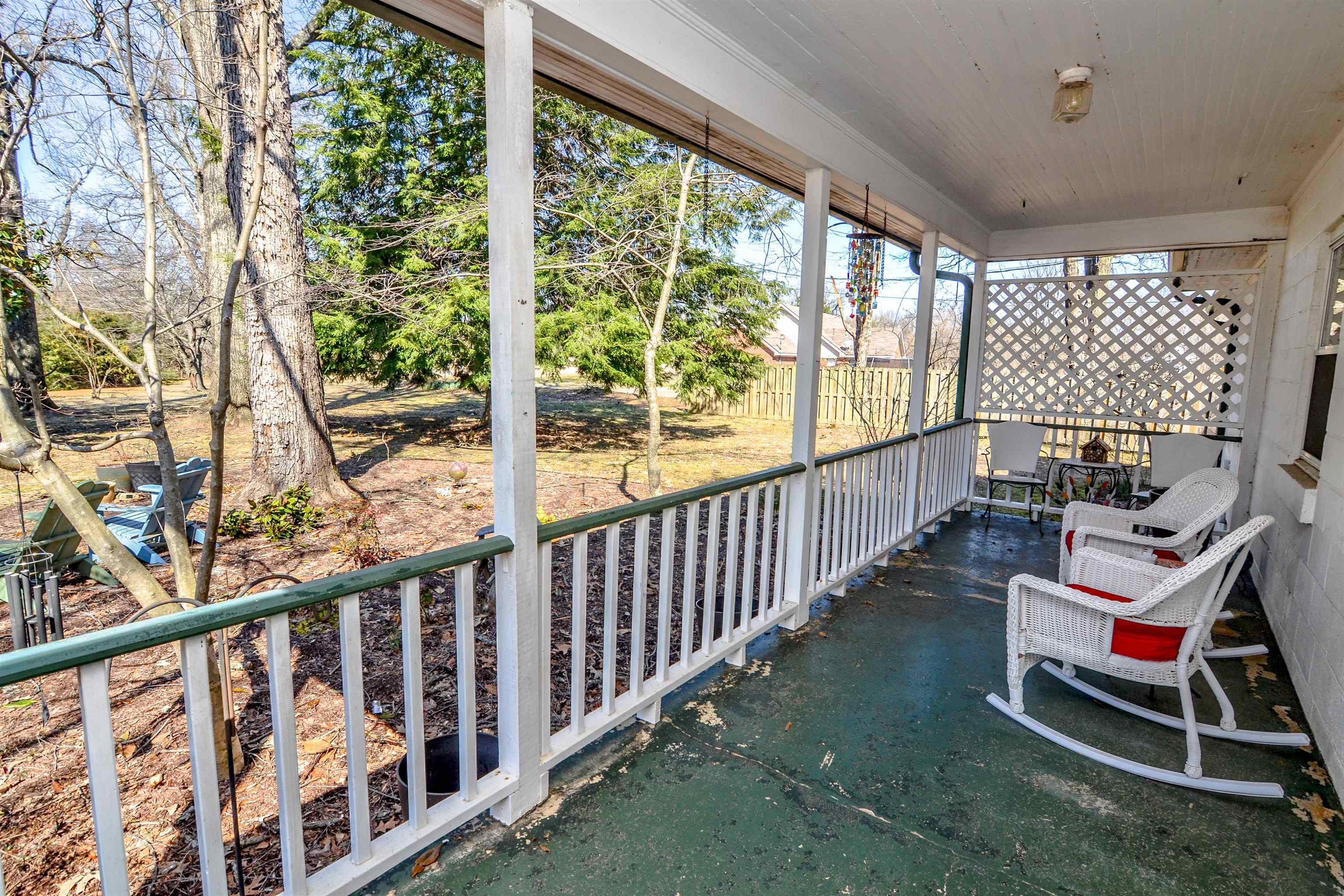 328 McQuiston Road Brighton, TN 38011 - Photo 2 of 25 Large, inviting front porch with room enough for everyone to gather.
