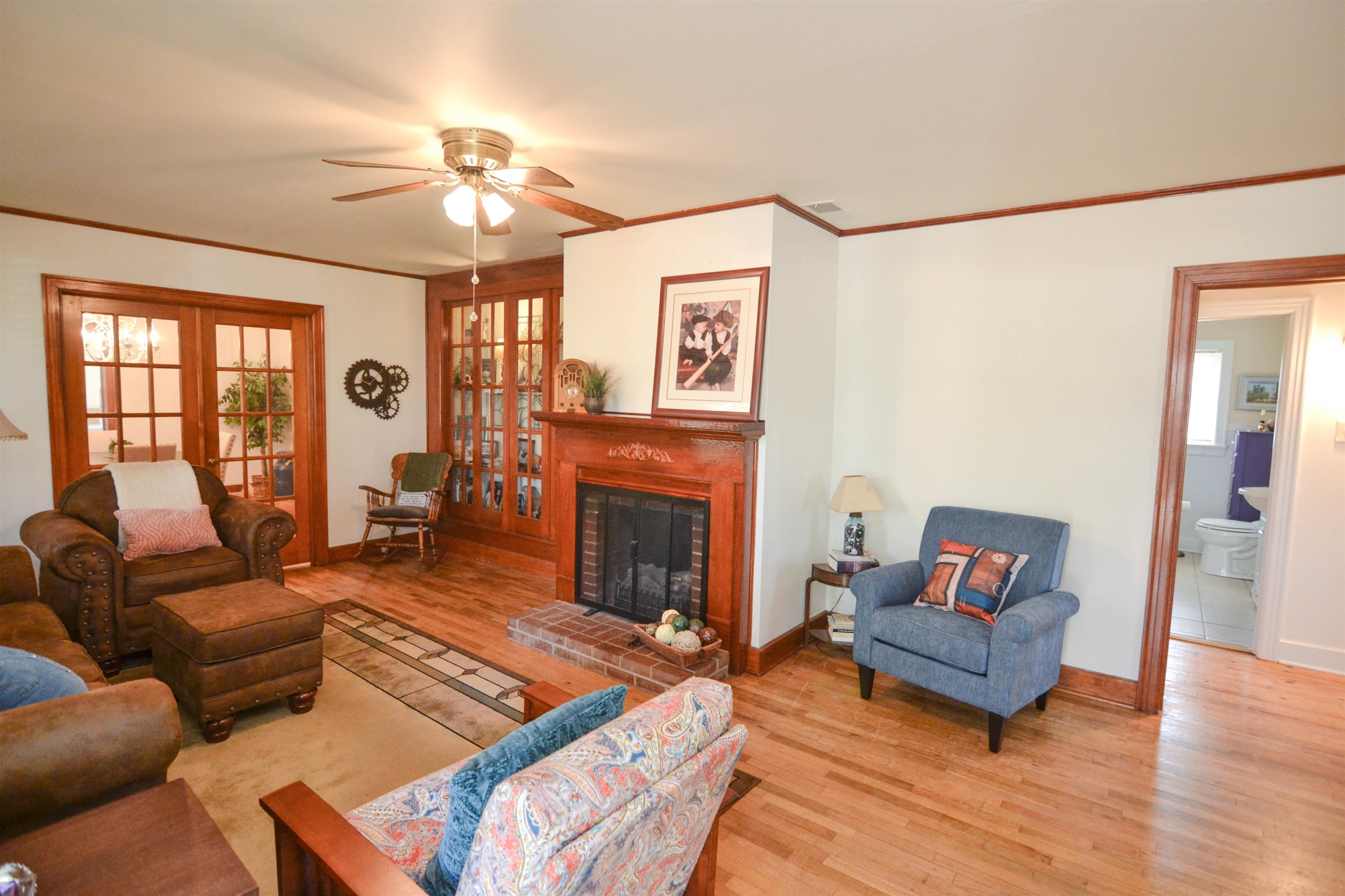 328 McQuiston Road Brighton, TN 38011 - Photo 3 of 25 Beautiful built in bookcase. Wood trim. Lots of character and detail throughout.