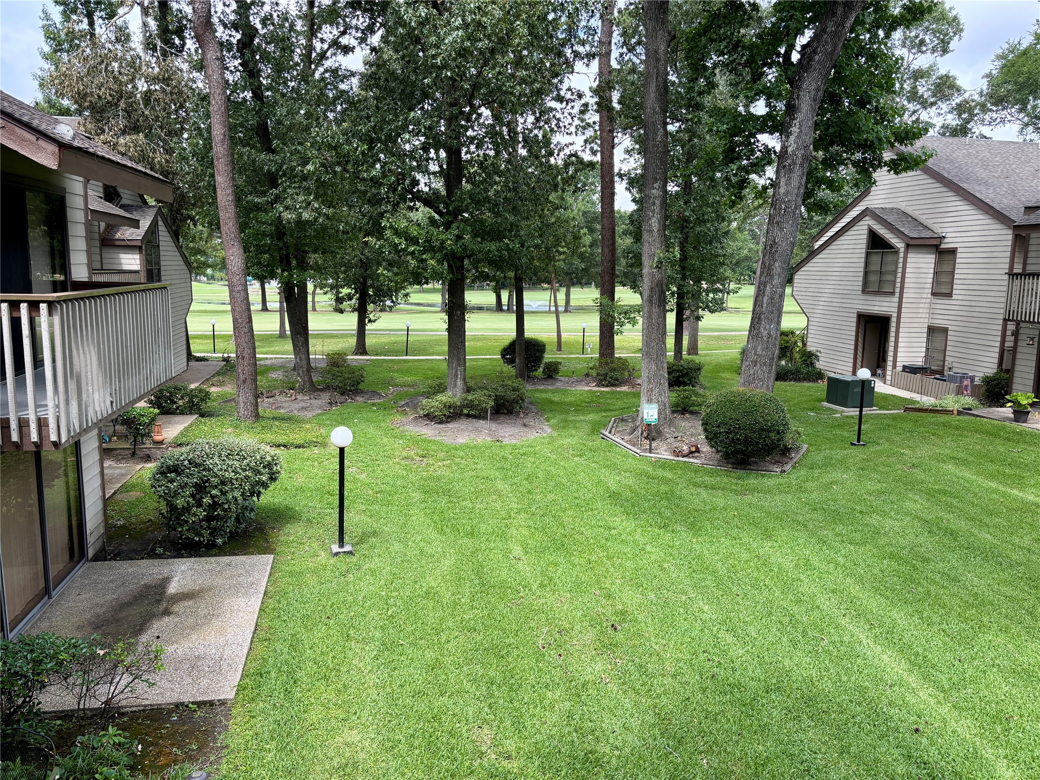 12900 Walden Road, Unit 508E Montgomery, TX 77356 - Photo 22 of 25 a view of backyard of house with green space