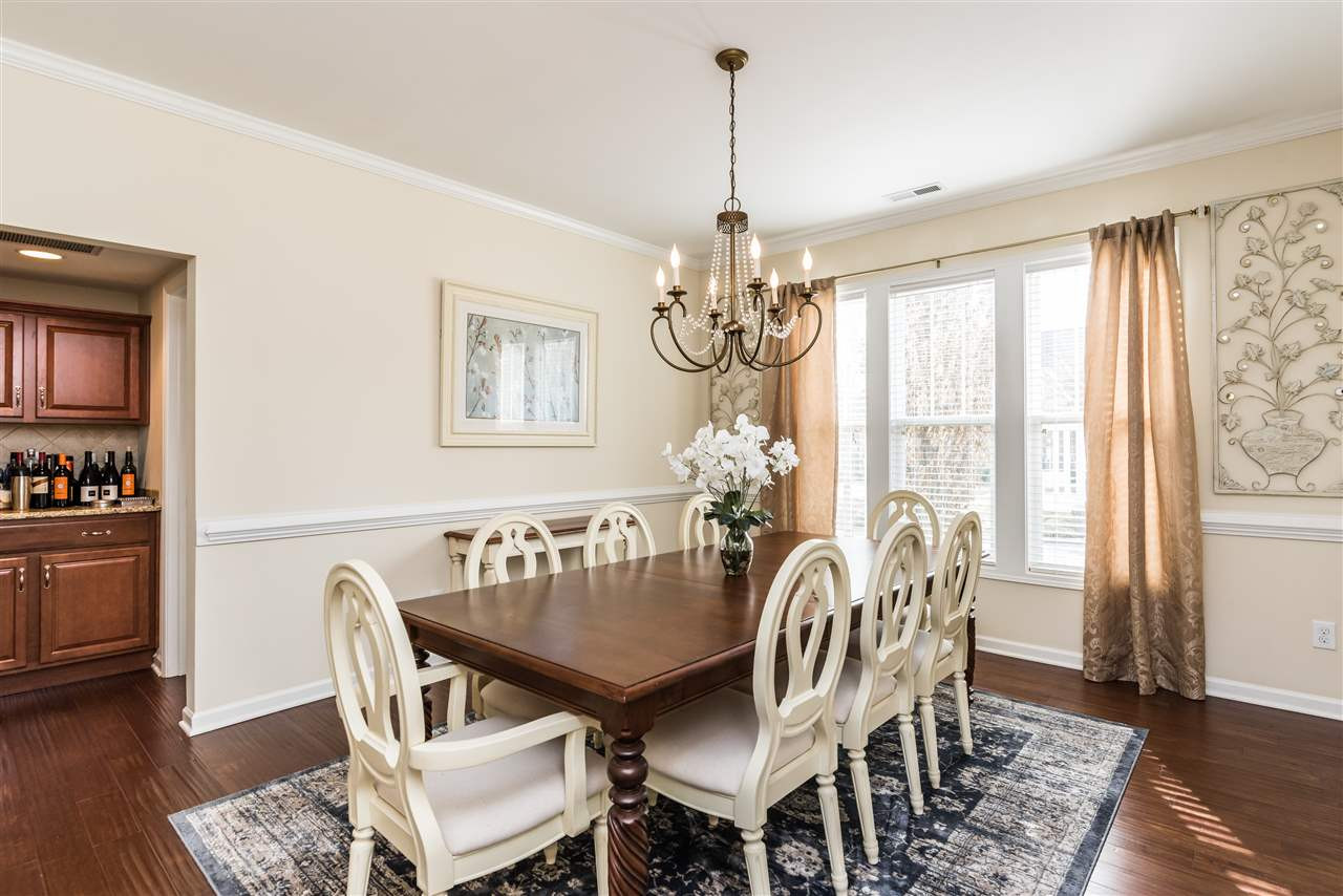 1413 Van Page Boulevard Raleigh, NC 27607 - Photo 4 of 25 SPACIOUS DINING ROOM WITH HARDWOODS AND PERFECT FOR ENTERTAINING! DINING ROOM