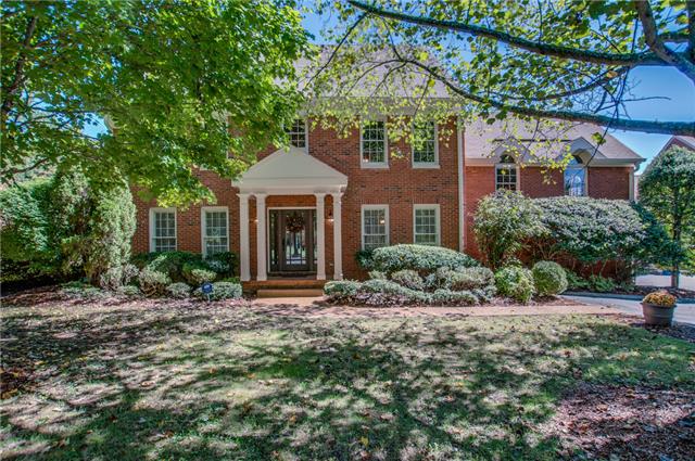 Stately home with parklike treed front yard on cul-de-sac lot in a wonderful neighborhood close in to Green Hills but easy commute to anywhere!