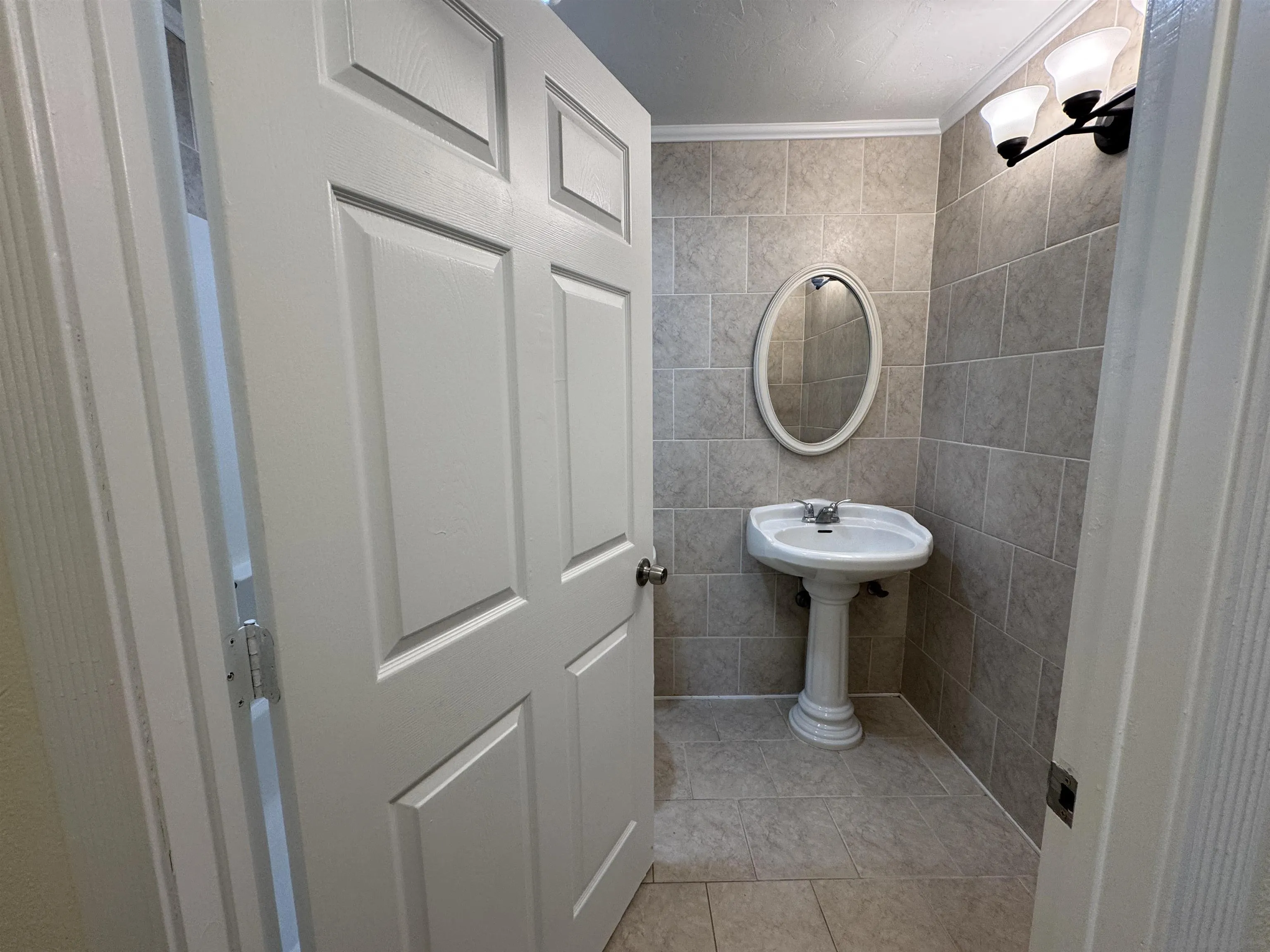 12923 Mapleview Street, Unit 8 Lakeside, CA 92040 - Photo 13 of 25 a bathroom with a sink a toilet and a mirror