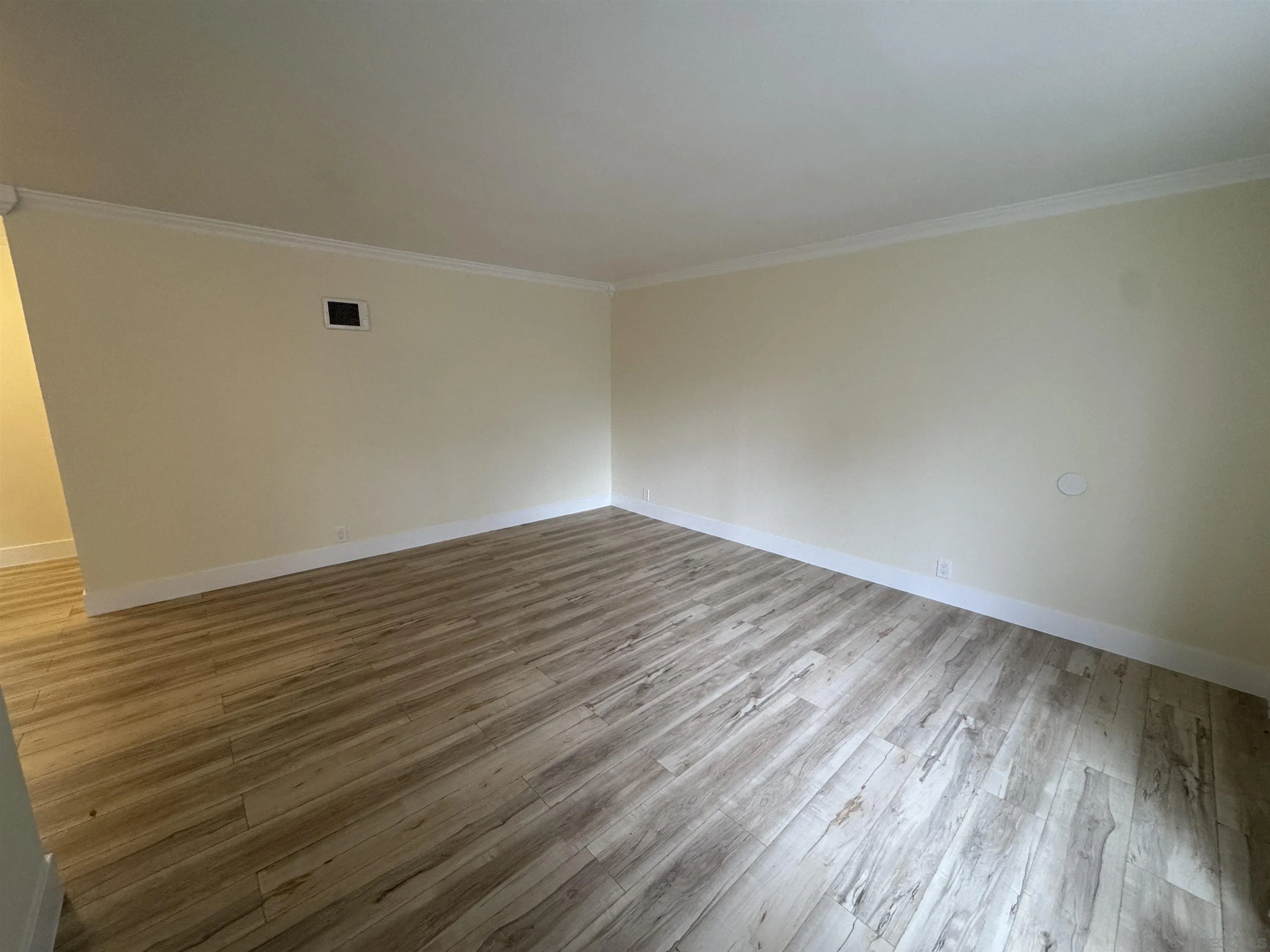 12923 Mapleview Street, Unit 8 Lakeside, CA 92040 - Photo 4 of 25 a view of an empty room with wooden floor