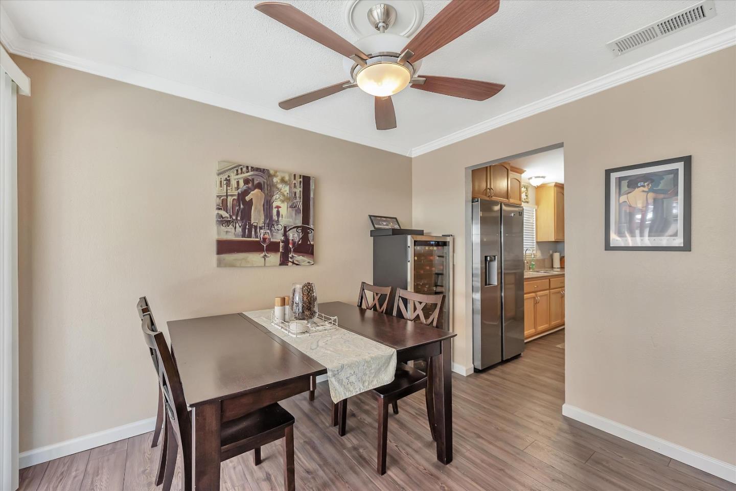 1391 3rd Street Gilroy, CA 95020 - Photo 13 of 40 a view of a dining room with furniture and wooden floor