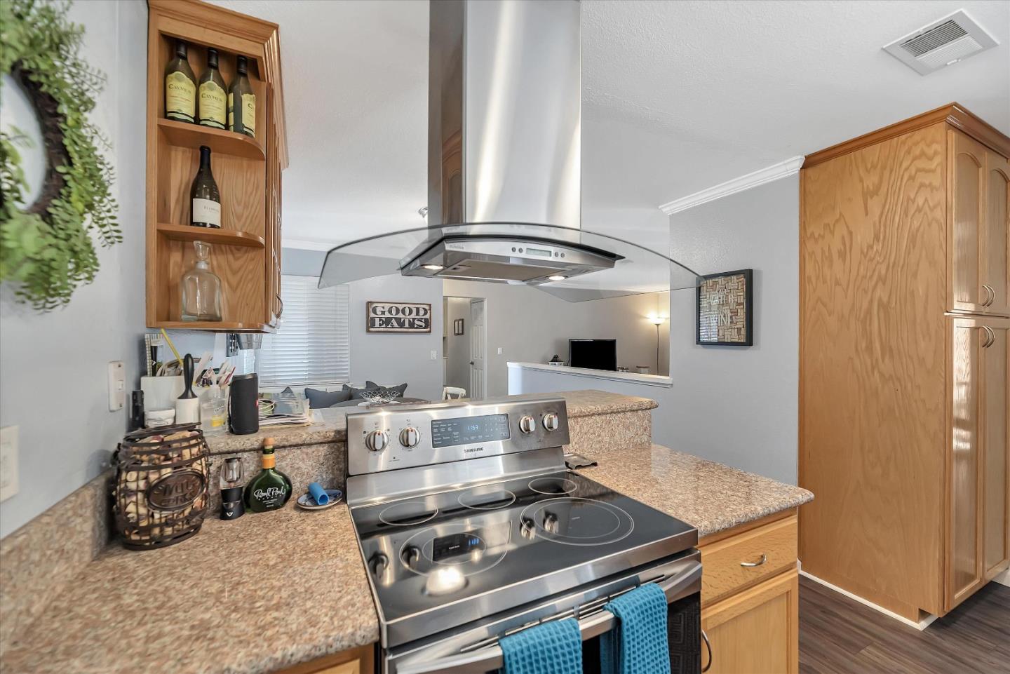 1391 3rd Street Gilroy, CA 95020 - Photo 18 of 40 a kitchen with a stove and a refrigerator
