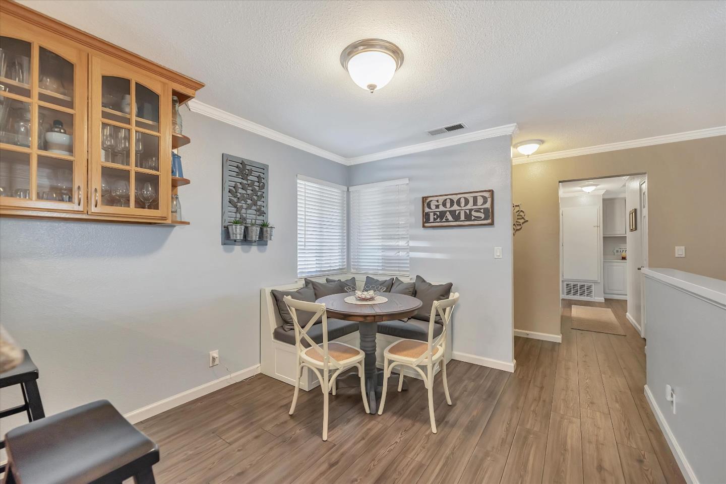 1391 3rd Street Gilroy, CA 95020 - Photo 19 of 40 a view of a dining room with furniture and wooden floor
