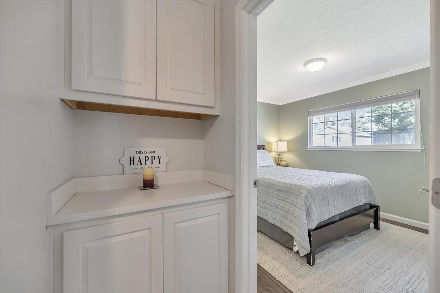 1391 3rd Street Gilroy, CA 95020 - Photo 21 of 40 a bedroom with a bed and window