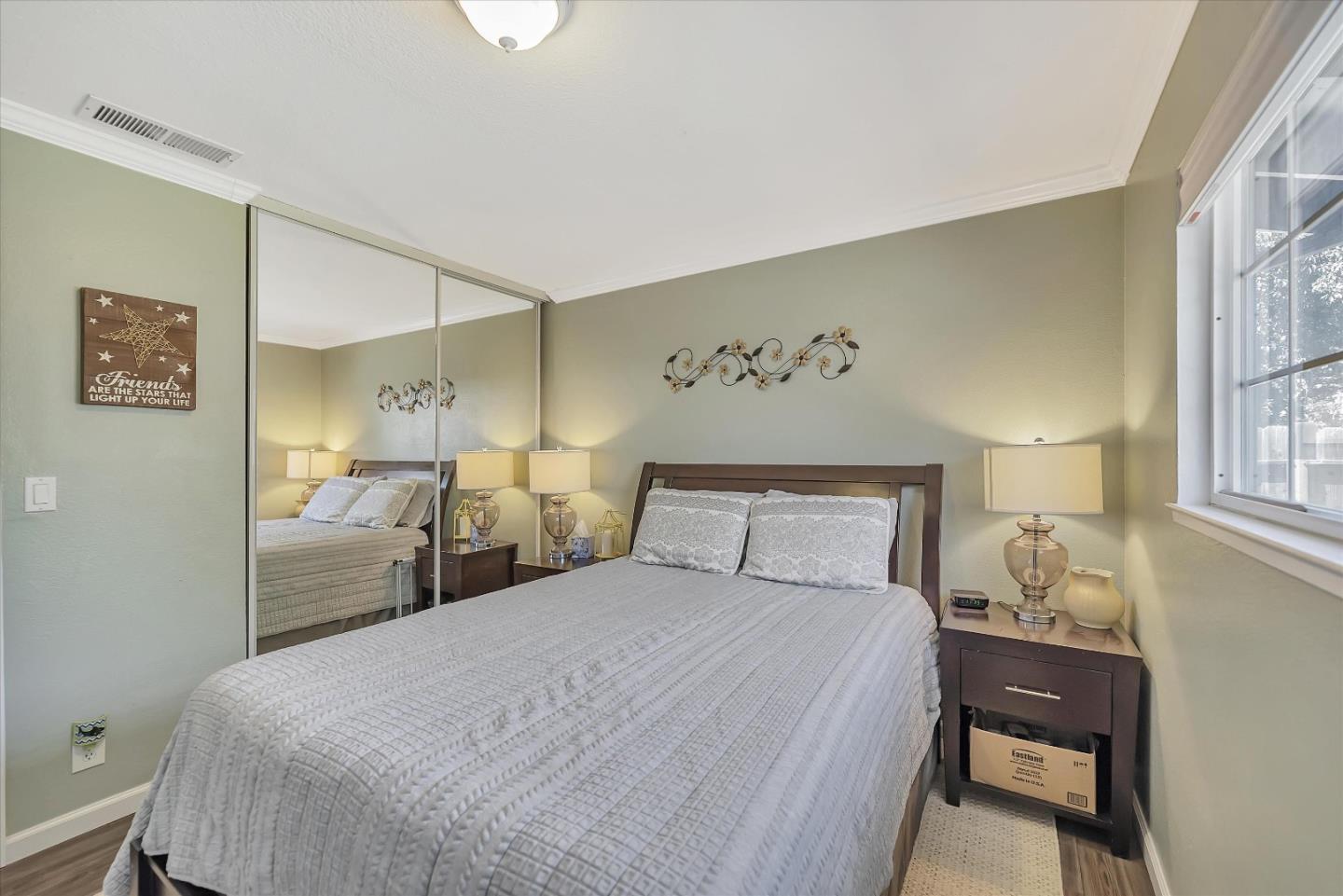 1391 3rd Street Gilroy, CA 95020 - Photo 23 of 40 a bedroom with a bed and a window