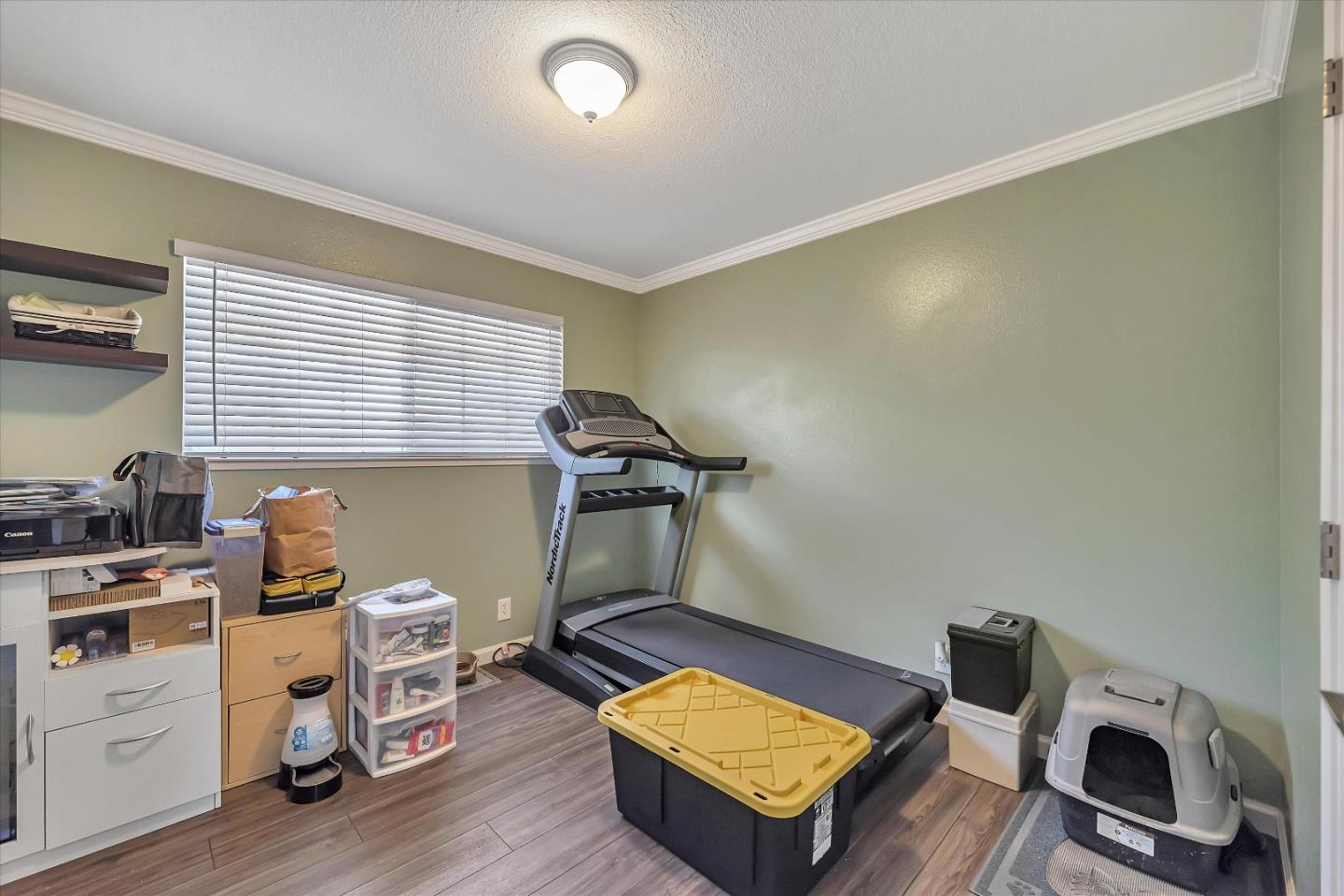1391 3rd Street Gilroy, CA 95020 - Photo 29 of 40 a room with furniture and wooden floor