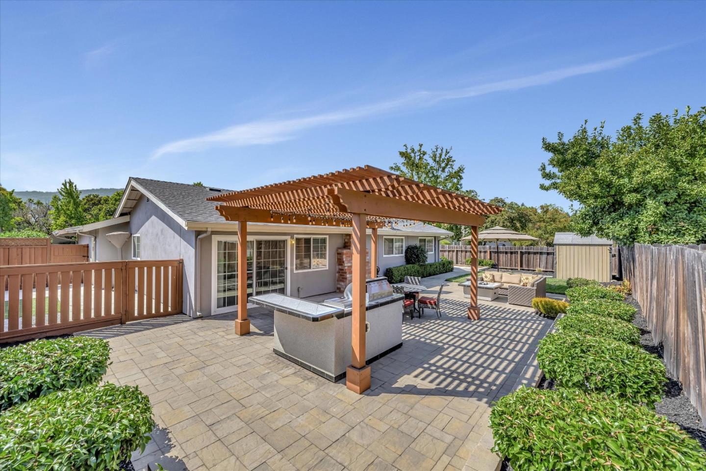1391 3rd Street Gilroy, CA 95020 - Photo 30 of 40 a view of a house with backyard and sitting area