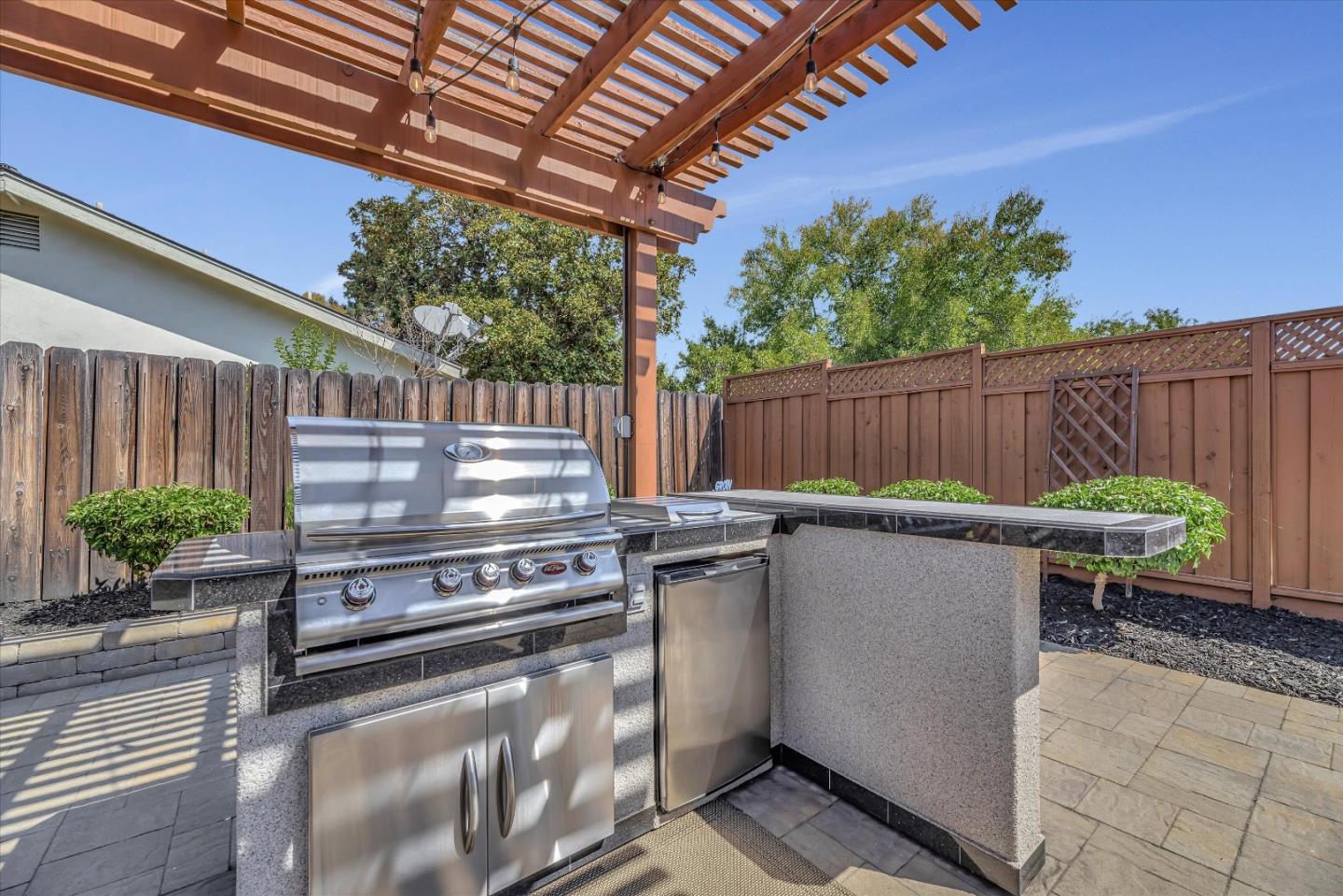 1391 3rd Street Gilroy, CA 95020 - Photo 34 of 40 a view of a chairs and table in the backyard