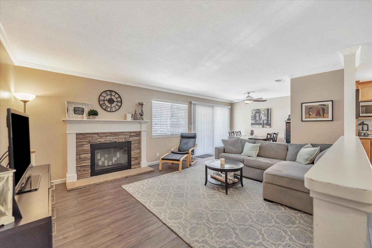 1391 3rd Street Gilroy, CA 95020 - Photo 6 of 40 a living room with furniture and a fireplace