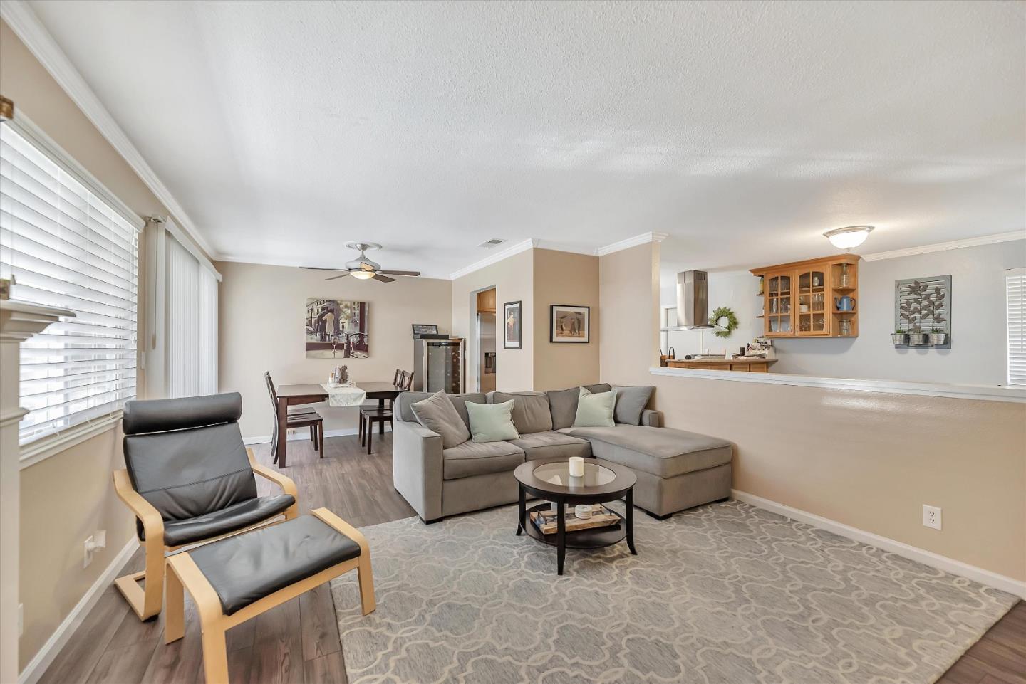 1391 3rd Street Gilroy, CA 95020 - Photo 8 of 40 a living room with furniture and a potted plant