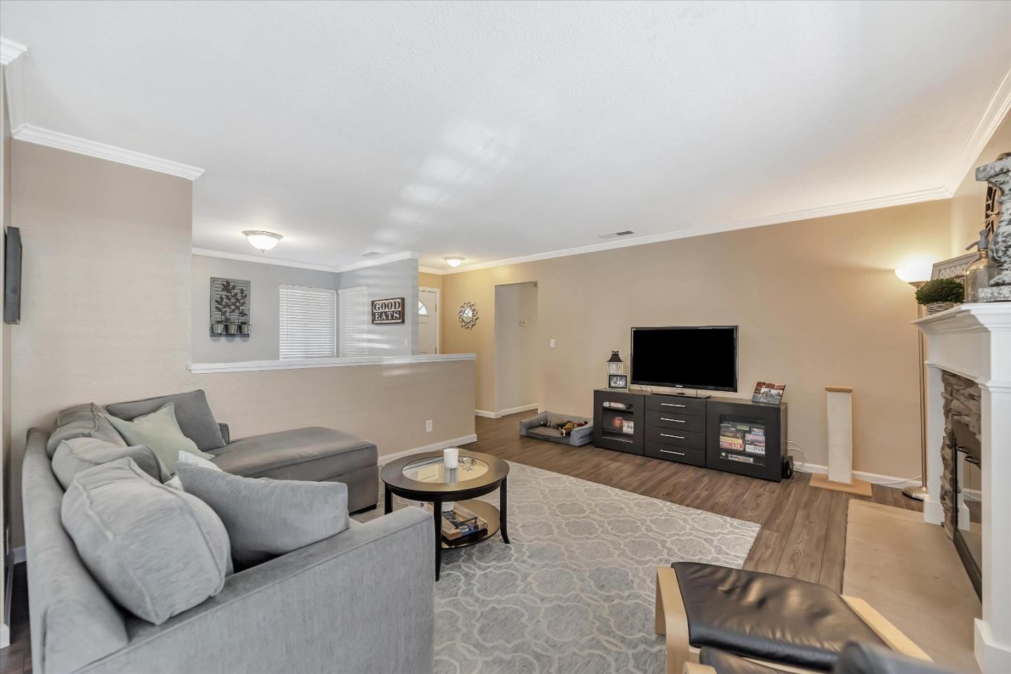 1391 3rd Street Gilroy, CA 95020 - Photo 10 of 40 a living room with furniture and a flat screen tv