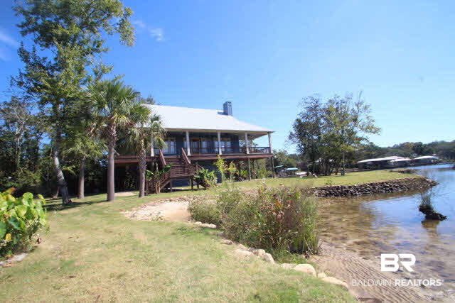 12900 Honey Rd Extension Summerdale, AL 36580 - Photo 16 of 44 Natural Rock Seawall surround
