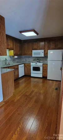 a bathroom with a sink and a window