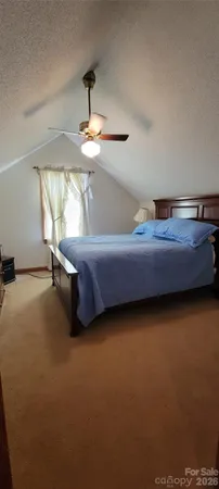 a kitchen with stainless steel appliances a stove a sink and a microwave