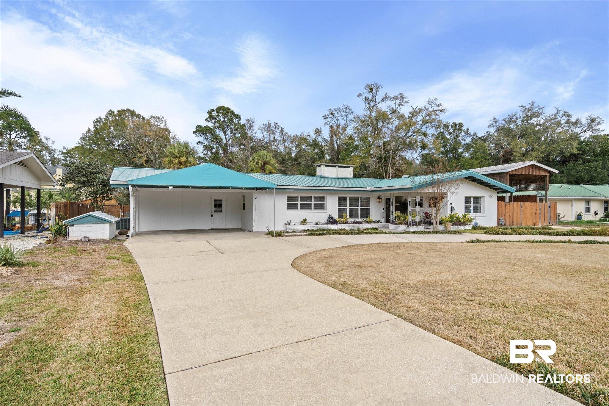 3720 Rabbit Creek Court Theodore, AL 36582 - Photo 45 of 47 View of front of home featuring concrete driveway, a carport, and a metal roof