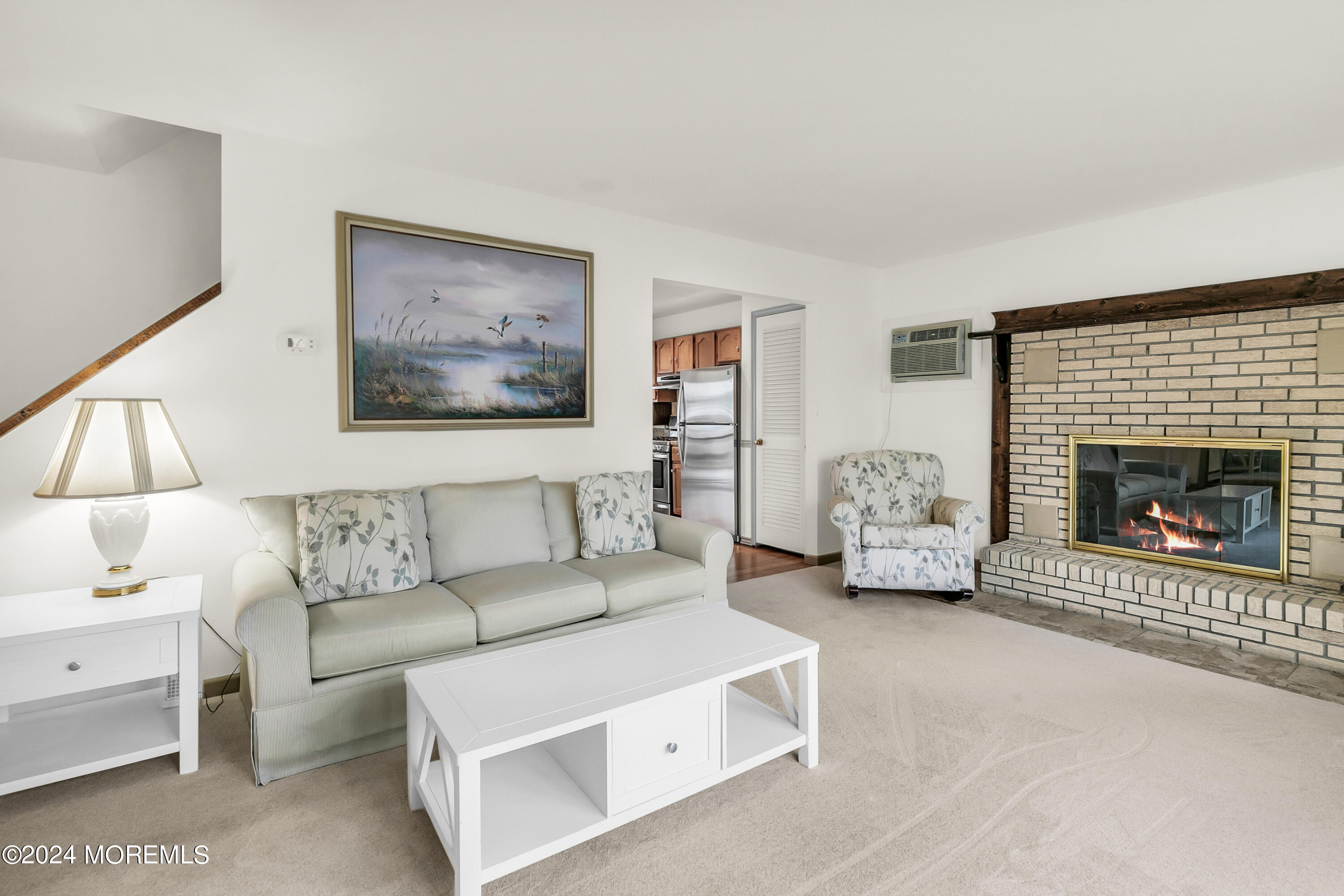35 Bay Way Brick, NJ 08723 - Photo 10 of 48 a living room with furniture and a fireplace